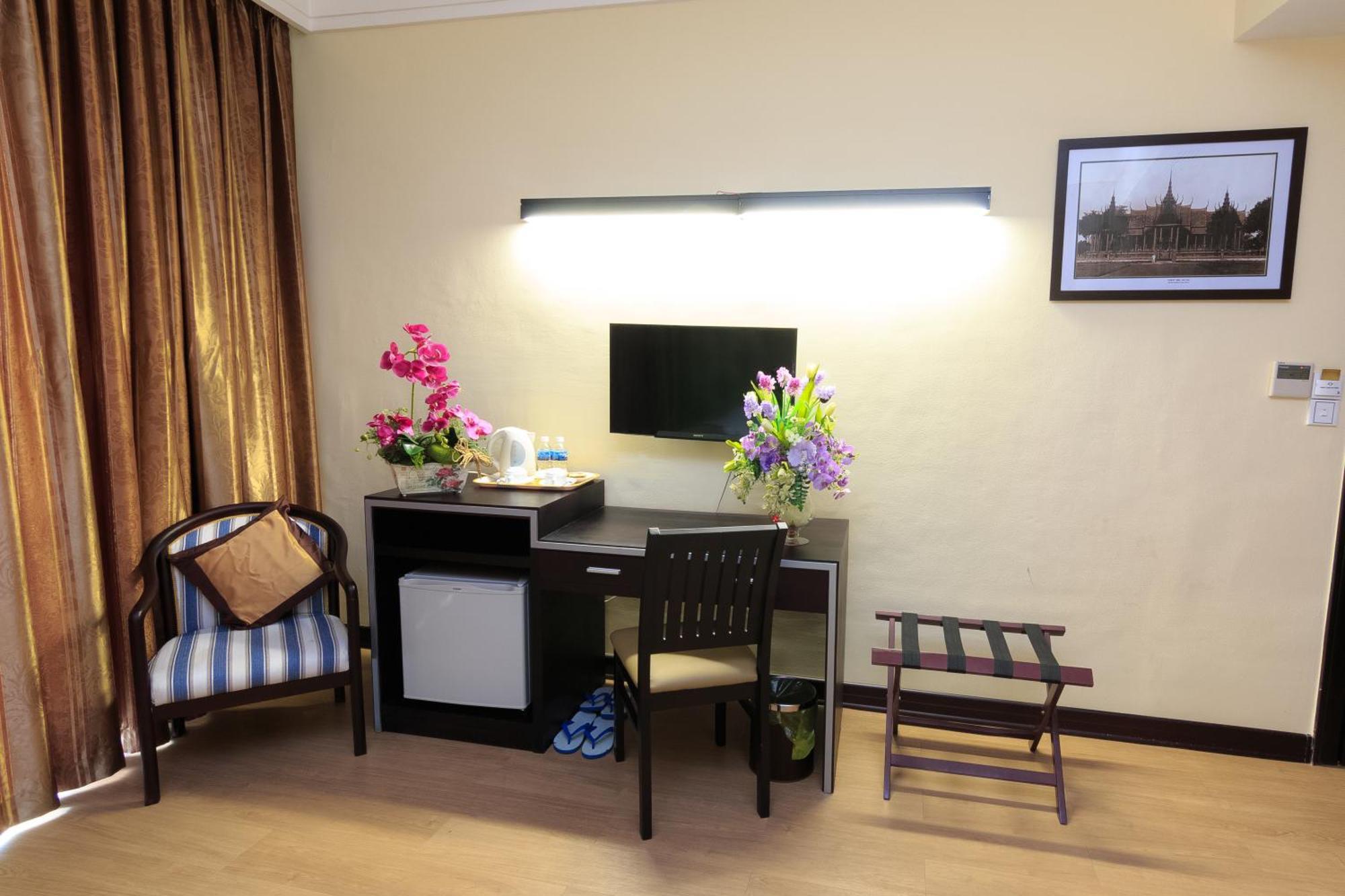 Paradise Hotel Phnom Penh Habitación foto