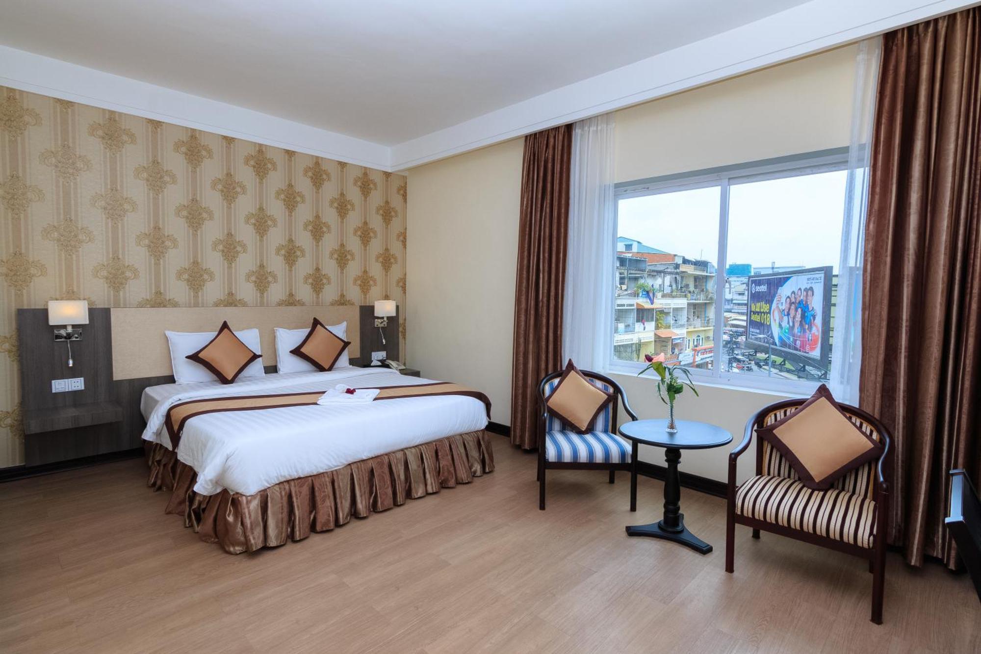 Paradise Hotel Phnom Penh Habitación foto