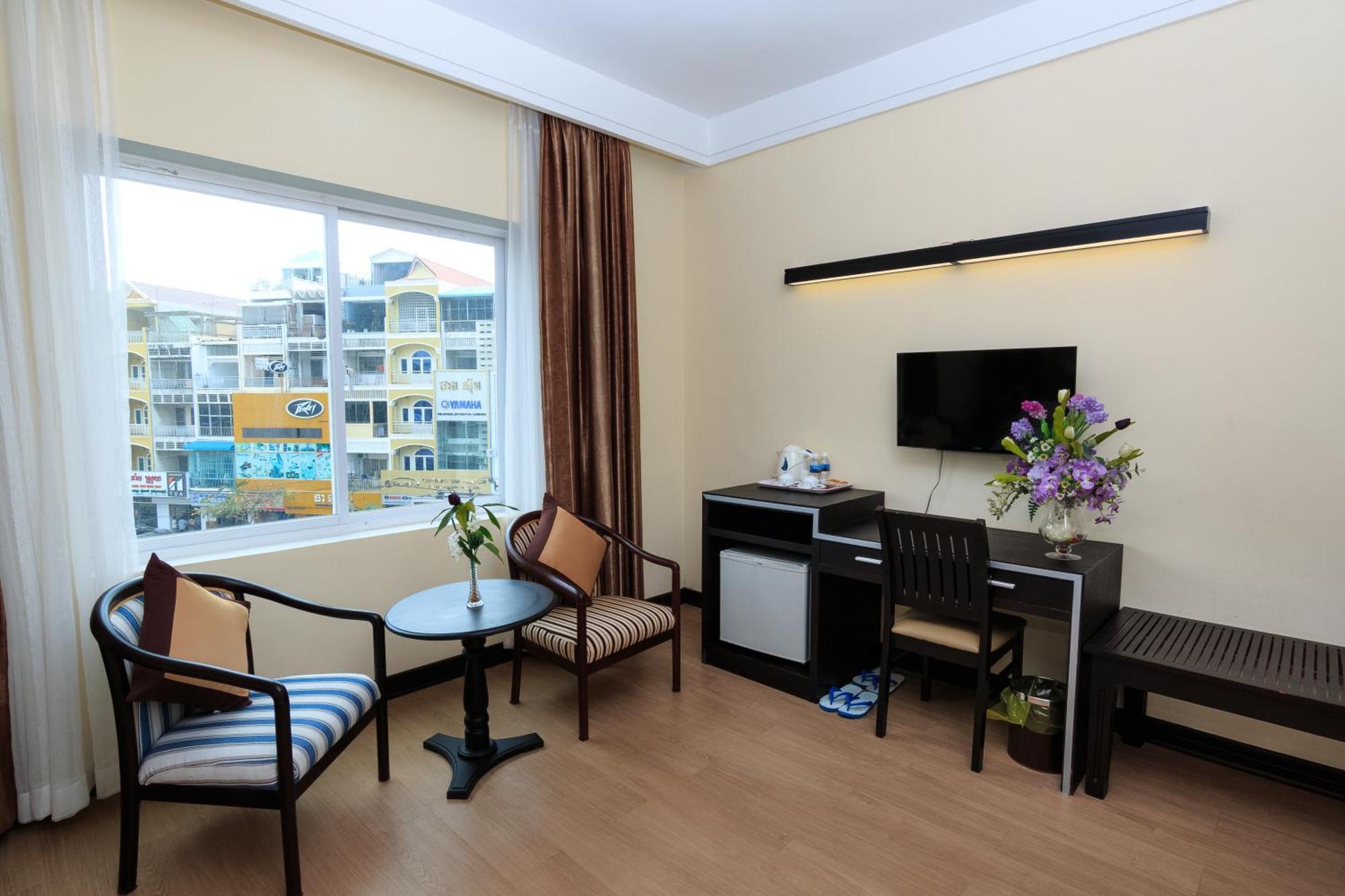 Paradise Hotel Phnom Penh Habitación foto