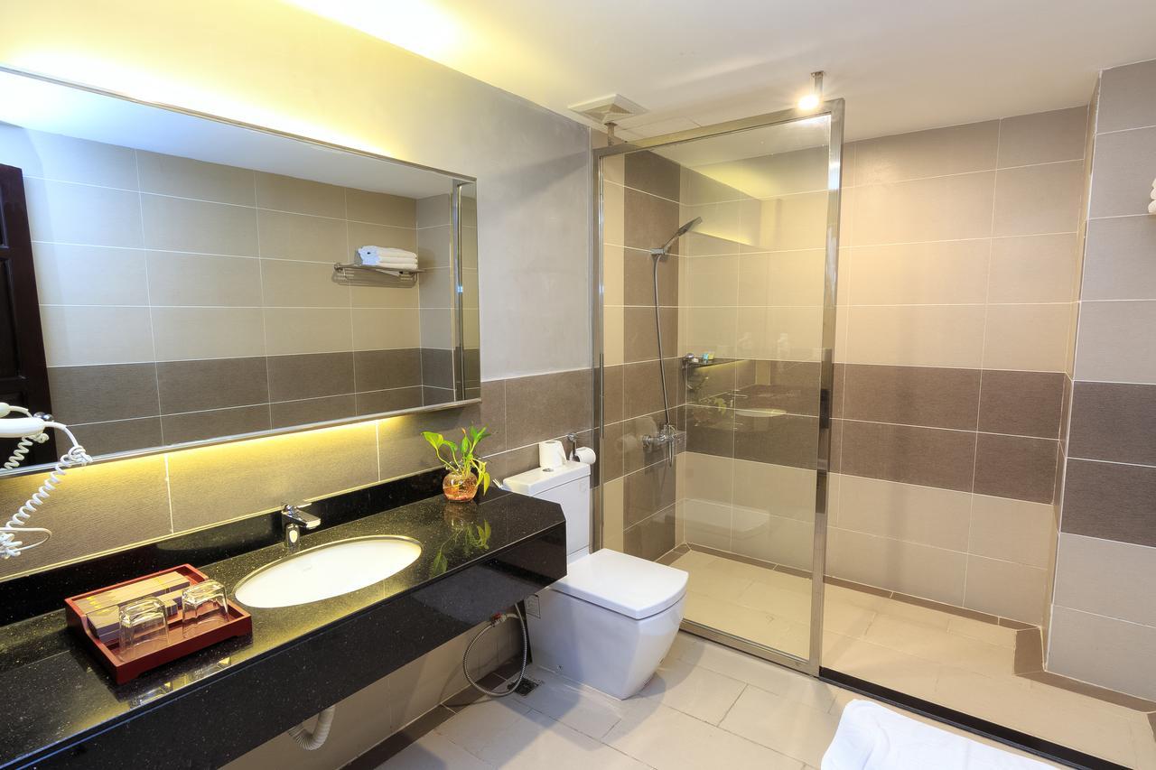 Paradise Hotel Phnom Penh Habitación foto