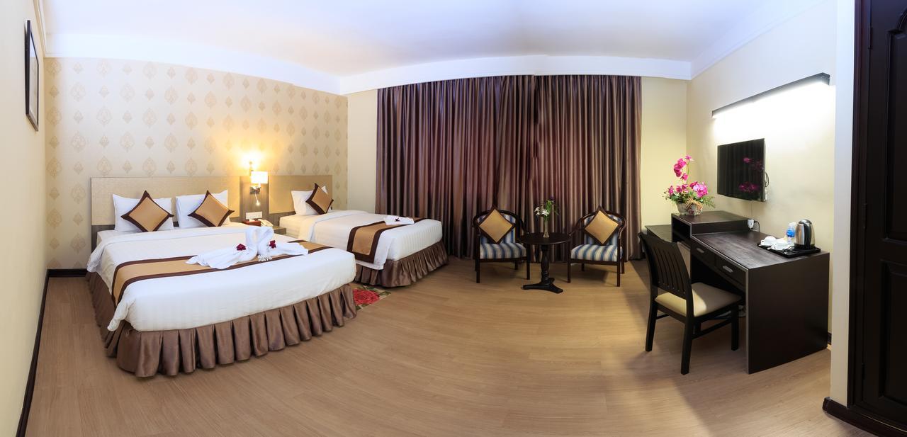 Paradise Hotel Phnom Penh Habitación foto